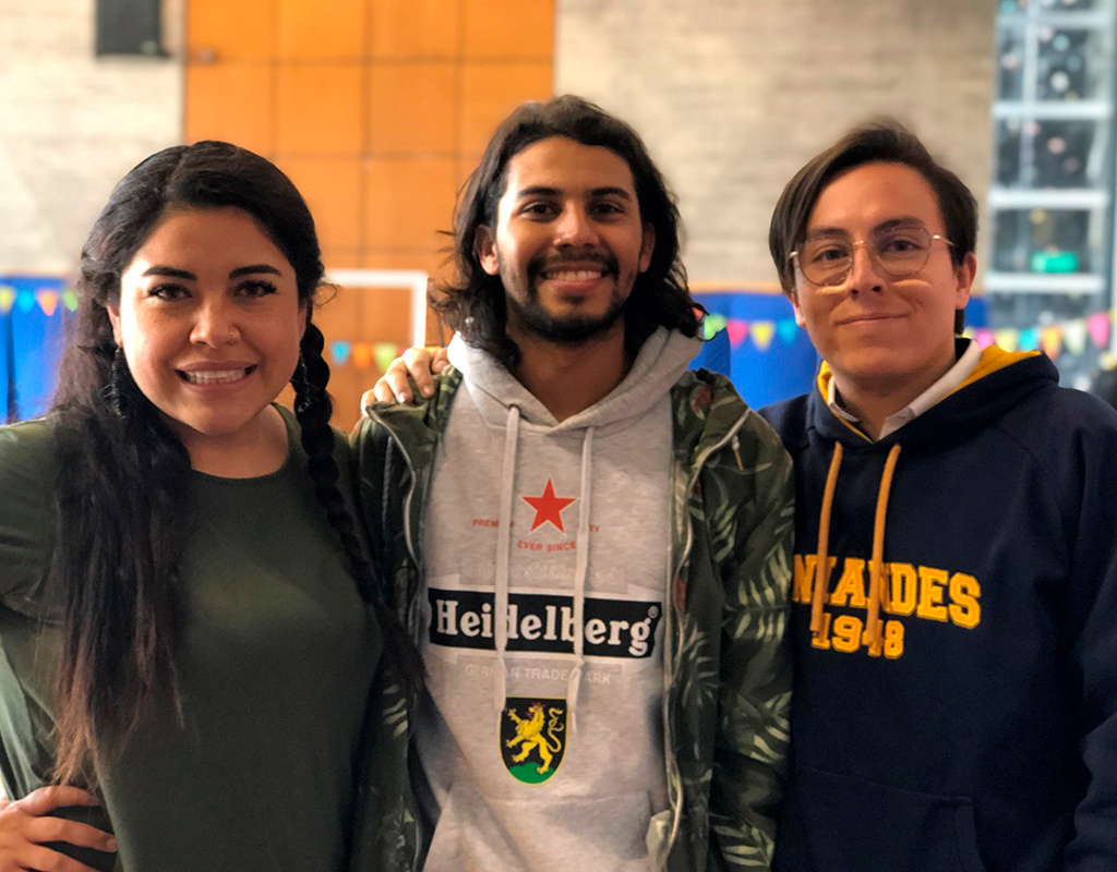 Foto plano medio de María del Pilar Pérez, Jean Paul Bernier (Equipo PLUS) y Juan Sebastián Robayo (CEU), durante la celebración del Día del Voluntario Uniandino 2019.