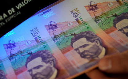 Foto de billetes de 50 mil pesos